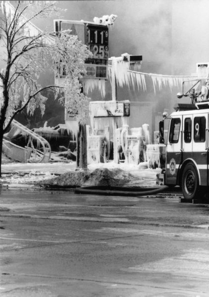 1996 - Firefighters battle blaze, weather